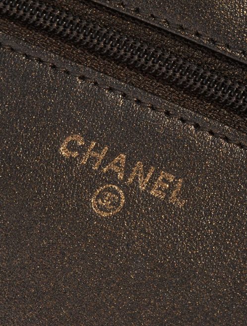 Pre-owned Chanel bag WOC Lamb Camellia Black / Shimmering Gold Black Logo | Sell your designer bag on Saclab.com