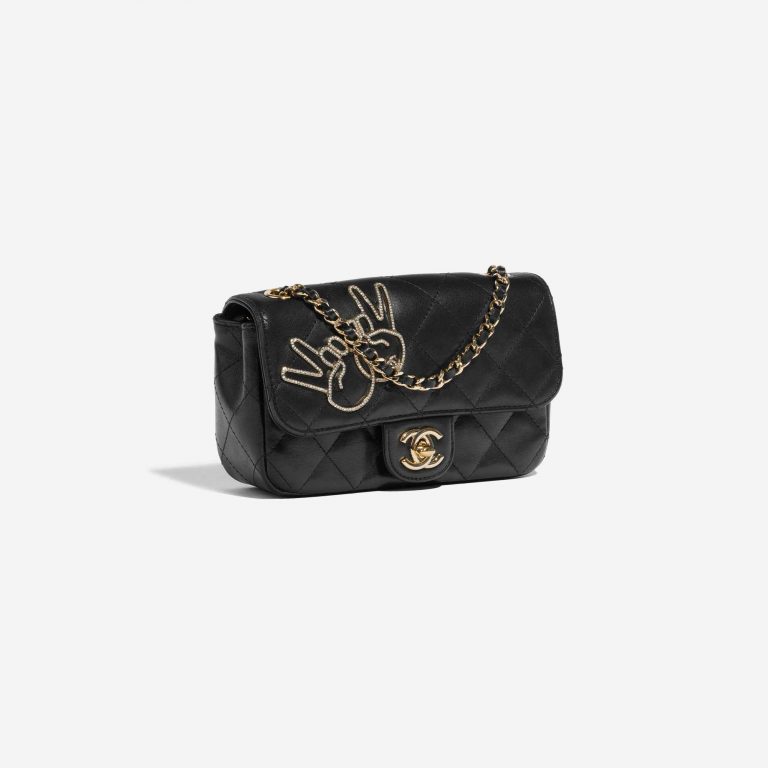Pre-owned Chanel bag Victory Peace Flap Bag Mini Lamb Black Black Side Front | Sell your designer bag on Saclab.com