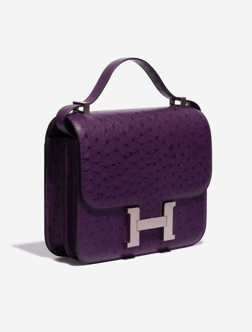 Pre-owned Hermès bag Constance 24 Ostrich Violin Violet Side Front | Sell your designer bag on Saclab.com