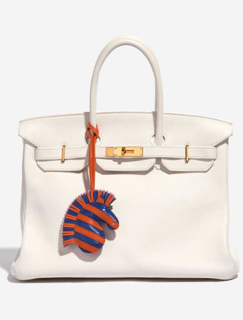 Pre-owned Hermès bag GeeGee Savannah Charm Milo Lamb Bleu de France / Orange Poppy / Mauve Sylvestre Blue, Orange, Rose Front | Sell your designer bag on Saclab.com
