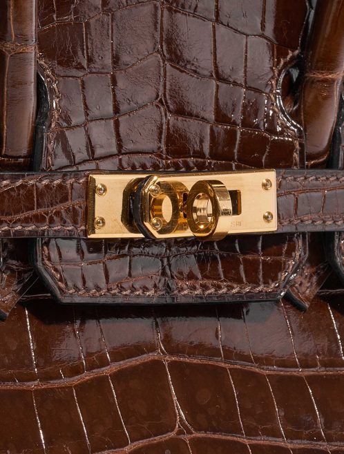 Pre-owned Hermès bag Birkin 25 Niloticus Crocodile Miel Brown Closing System | Sell your designer bag on Saclab.com