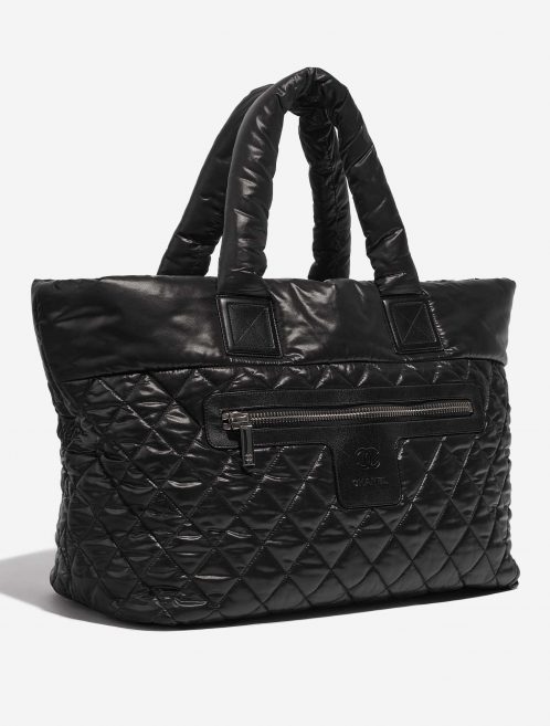 Pre-owned Chanel bag Cocoon Shopper Synthetic Black Black Side Front | Sell your designer bag on Saclab.com