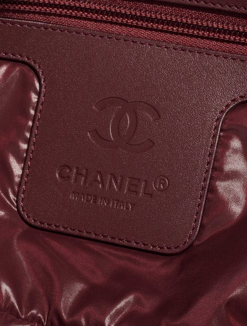 Pre-owned Chanel bag Cocoon Shopper Synthetic Black Black Logo | Sell your designer bag on Saclab.com