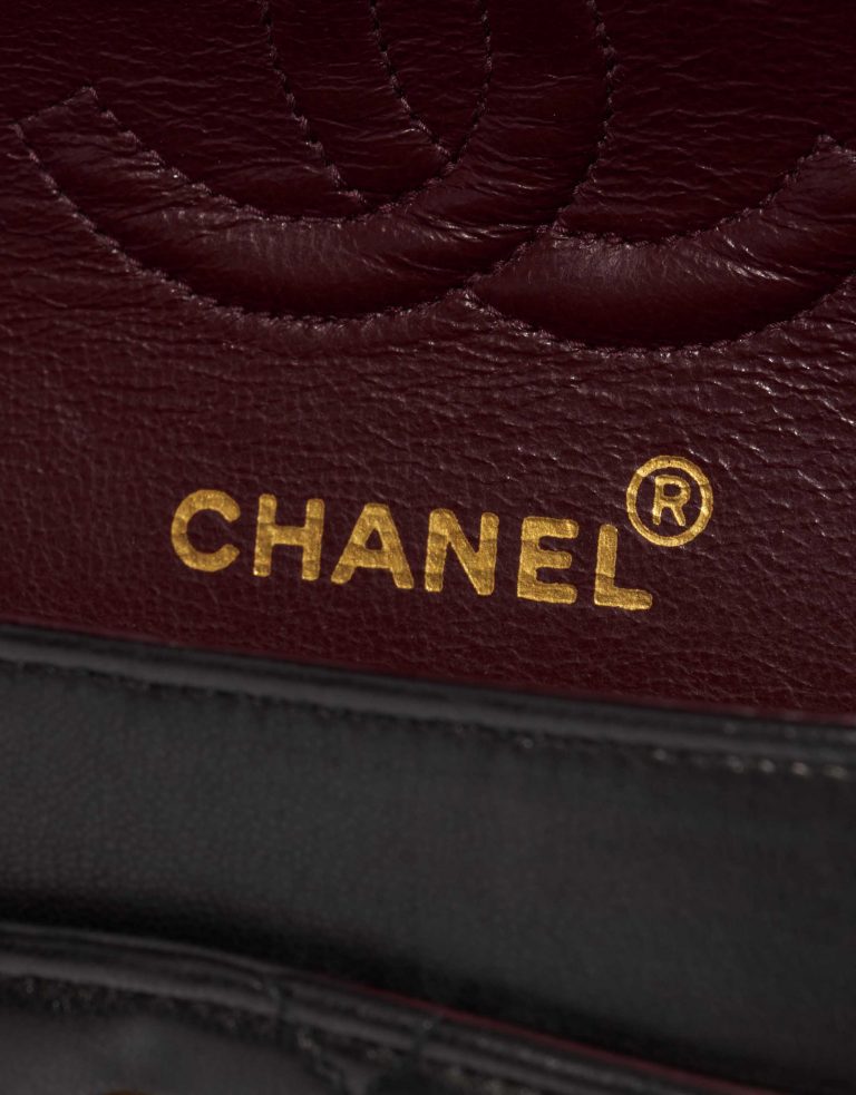 Pre-owned Chanel bag Timeless Small Lamb Black Black Logo | Sell your designer bag on Saclab.com
