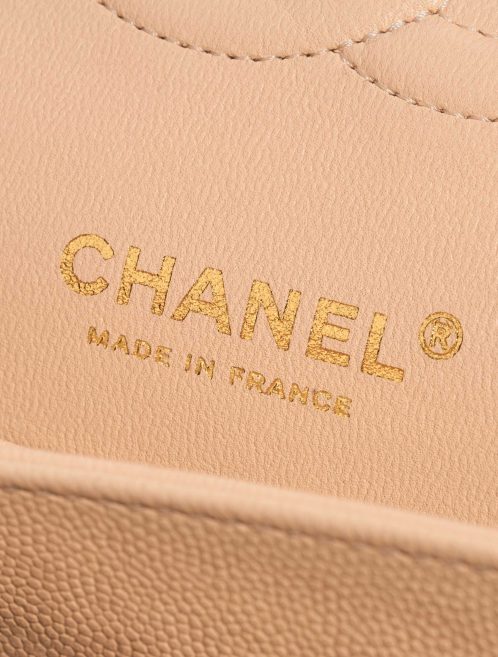 Pre-owned Chanel bag Timeless Medium Caviar Nude Beige Logo | Sell your designer bag on Saclab.com