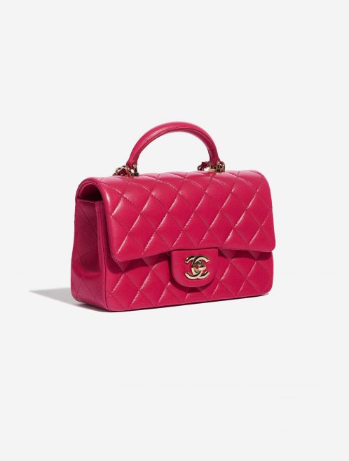 Pre-owned Chanel bag Timeless Mini Rectangular Lamb Raspberry Pink, Rose Side Front | Sell your designer bag on Saclab.com