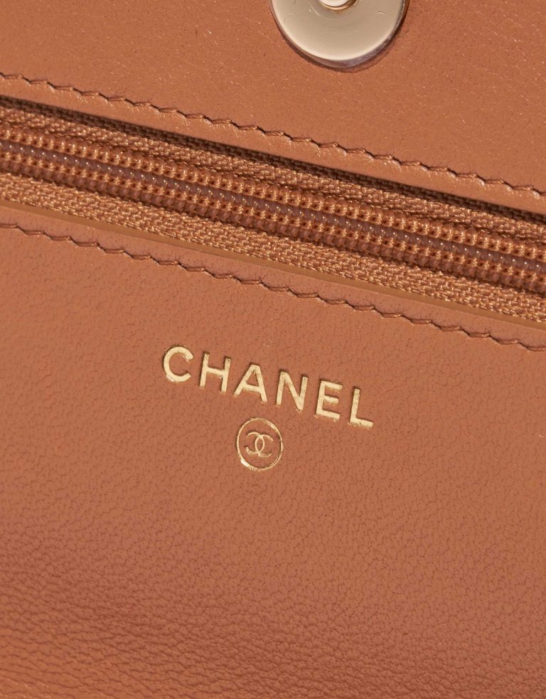 Pre-owned Chanel bag Timeless WOC Lamb Beige Beige Logo | Sell your designer bag on Saclab.com