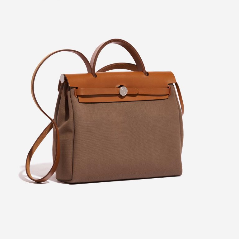 Pre-owned Hermès bag Herbag 31 Toile / Vache Hunter Etoupe-Dune / Fauve Brown Side Front | Sell your designer bag on Saclab.com