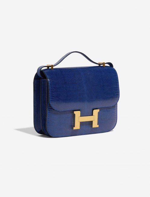 Pre-owned Hermès bag Constance 18 Salvator Lizard Blue Sapphire Blue Side Front | Sell your designer bag on Saclab.com