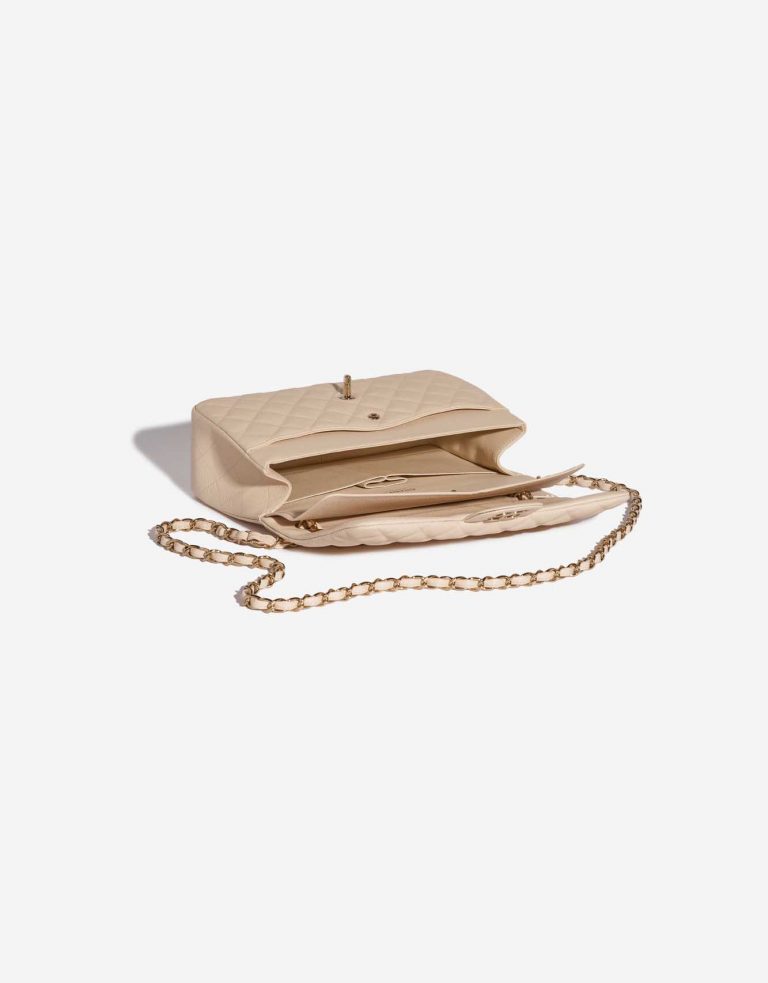 Pre-owned Chanel bag Timeless Jumbo Caviar Light Beige Beige Inside | Sell your designer bag on Saclab.com