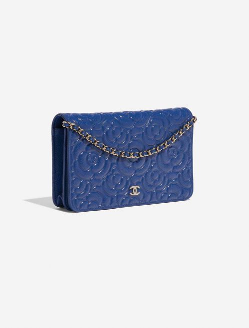Pre-owned Chanel bag WOC Camellia Lamb Blue Blue Side Front | Sell your designer bag on Saclab.com
