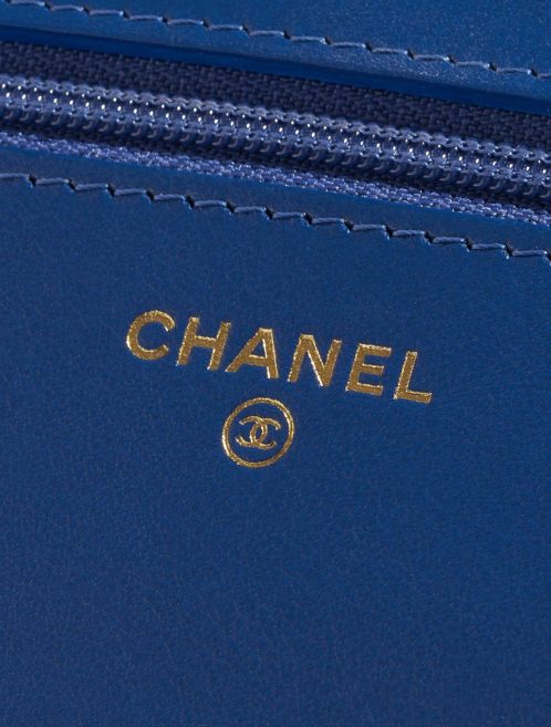 Pre-owned Chanel bag WOC Camellia Lamb Blue Blue Logo | Sell your designer bag on Saclab.com
