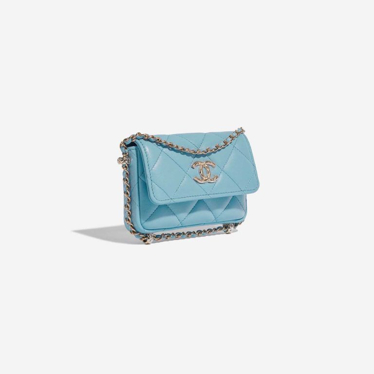 Pre-owned Chanel bag Timeless Micro WOC Lamb Tiffany Blue Blue Side Front | Sell your designer bag on Saclab.com