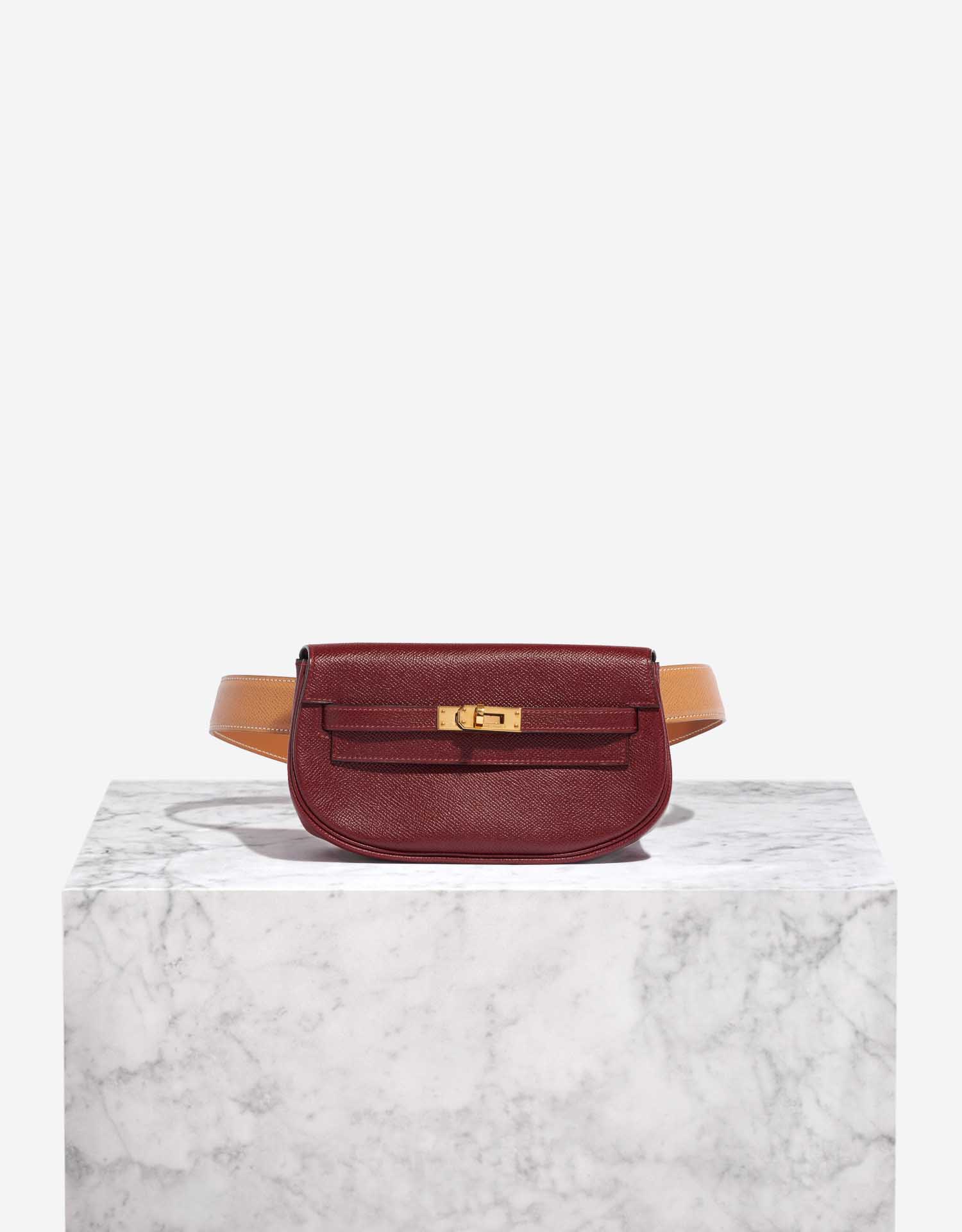 HERMES（エルメス）- Pochette Pilo（ピロ）ボルドーレッド Pochette Pilo | Hermès Canada