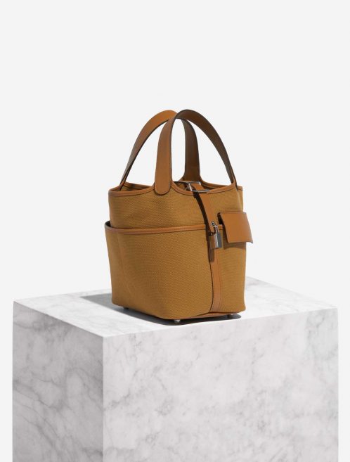 Pre-owned Hermès bag Picotin Cargo 18 Canvas Sesame Brown Side Front | Sell your designer bag on Saclab.com