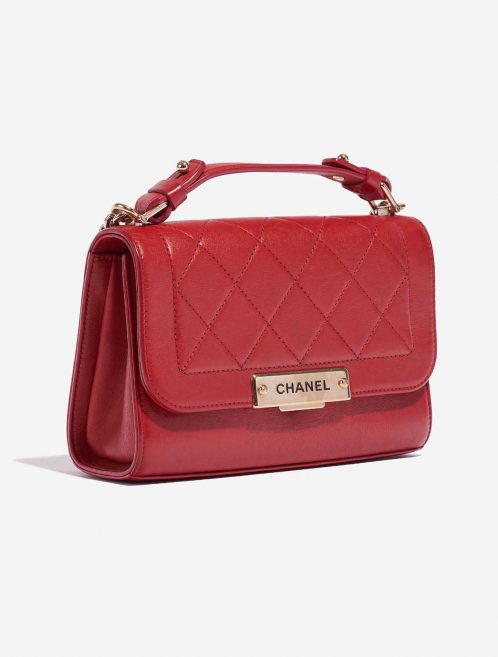 Pre-owned Chanel bag Flap Bag Handle Lamb Red Red Side Front | Sell your designer bag on Saclab.com