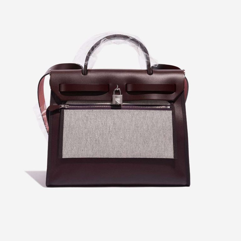 Pre-owned Hermès bag Herbag 31 Vache Hunter / Coated Toile / Toile  Rouge Sellier / Cassis / Écru / Black Black, Red Back | Sell your designer bag on Saclab.com