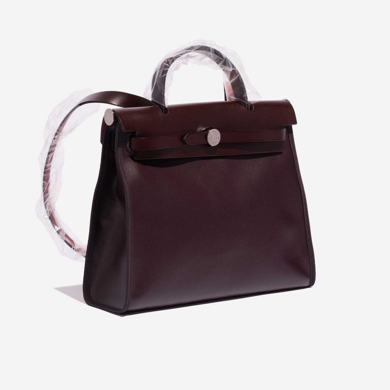Pre-owned Hermès bag Herbag 31 Vache Hunter / Coated Toile / Toile  Rouge Sellier / Cassis / Écru / Black Black, Red Side Front | Sell your designer bag on Saclab.com