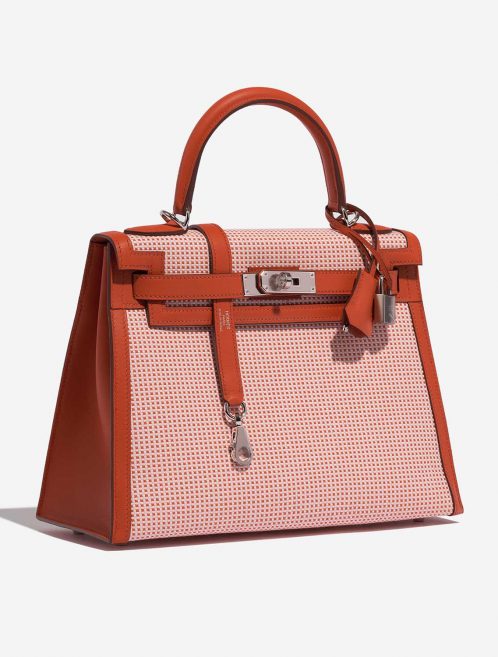 Pre-owned Hermès bag Kelly 28 Toile Quadrille / Swift Terre Battue / Mauve Sylvestre / Blanc Red, Rose, White Side Front | Sell your designer bag on Saclab.com