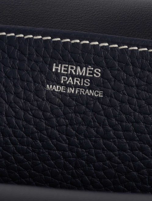 Pre-owned Hermès bag Halzan 31 Clemence Bleu Nuit / Black Black, Blue Logo | Sell your designer bag on Saclab.com
