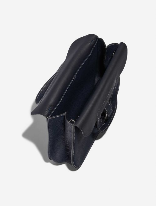 Pre-owned Hermès bag Halzan 31 Clemence Bleu Nuit / Black Black, Blue Inside | Sell your designer bag on Saclab.com