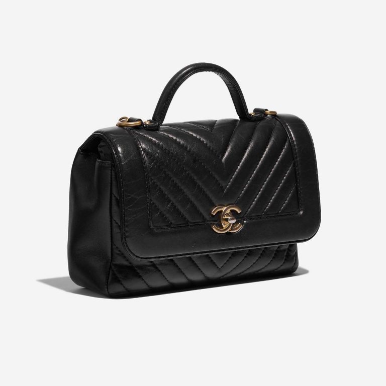 Pre-owned Chanel bag Timeless Handle Small Lamb Black Black Side Front | Sell your designer bag on Saclab.com