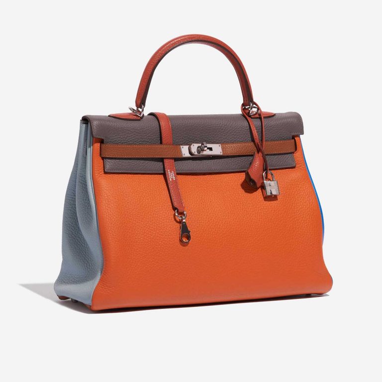 Pre-owned Hermès bag Kelly 35 Harlequin Togo Orange /  Etain / Blue Lin / Sanguine / Blue Hydra / Gold Multicolour, Orange, Red Side Front | Sell your designer bag on Saclab.com