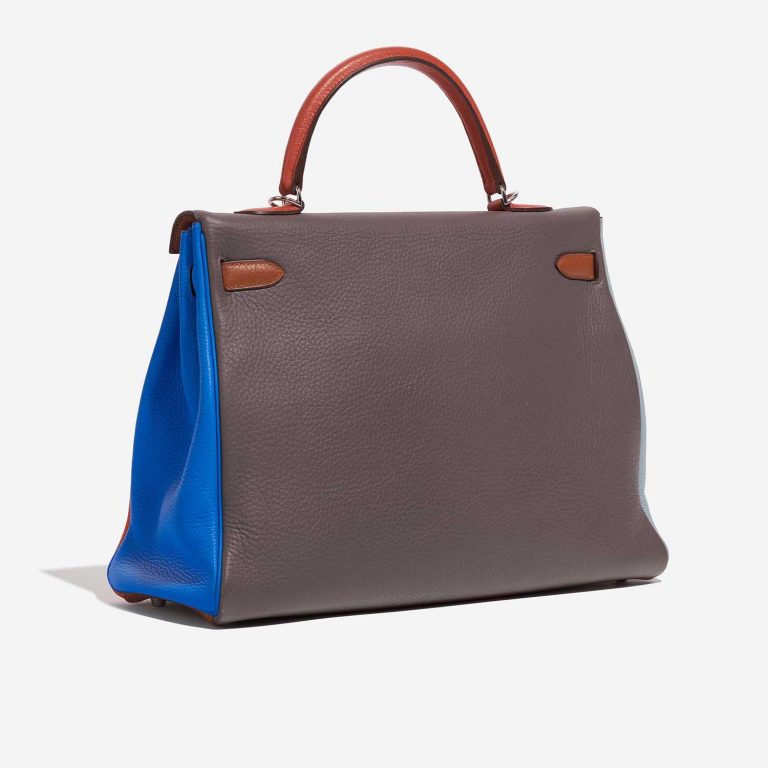 Pre-owned Hermès bag Kelly 35 Harlequin Togo Orange /  Etain / Blue Lin / Sanguine / Blue Hydra / Gold Multicolour, Orange, Red Side Back | Sell your designer bag on Saclab.com