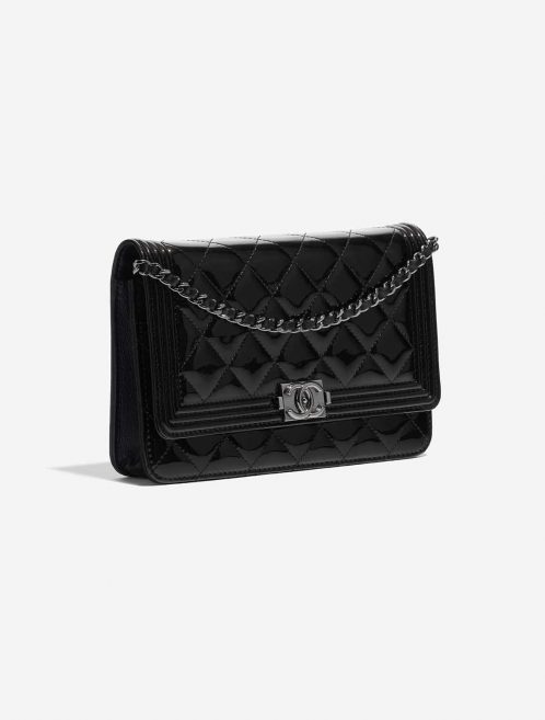 Pre-owned Chanel bag Boy WOC Patent Leather Black Black Side Front | Sell your designer bag on Saclab.com