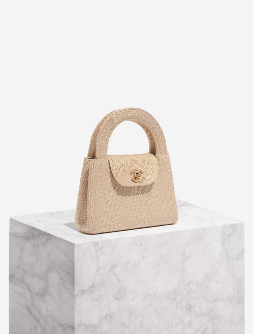 Pre-owned Chanel bag Timeless Handle Small Silk Rope Beige Beige Side Front | Sell your designer bag on Saclab.com