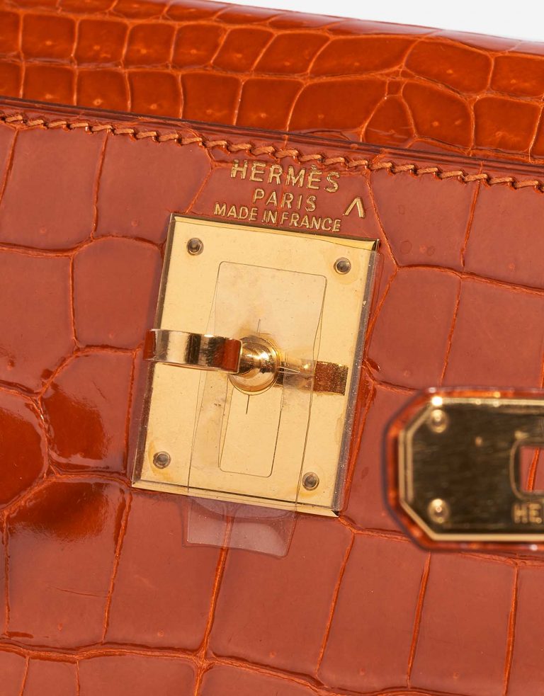 Pre-owned Hermès bag Kelly 28 Porosus Crocodile Orange H Orange Closing System | Sell your designer bag on Saclab.com