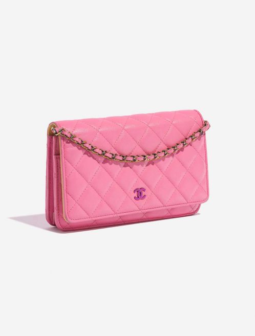 Pre-owned Chanel bag Timeless WOC Lamb Pink / Yellow Pink Side Front | Sell your designer bag on Saclab.com