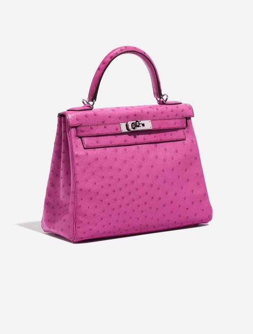 Pre-owned Hermès bag Kelly 28 Ostrich Fuchsia Pink Side Front | Sell your designer bag on Saclab.com
