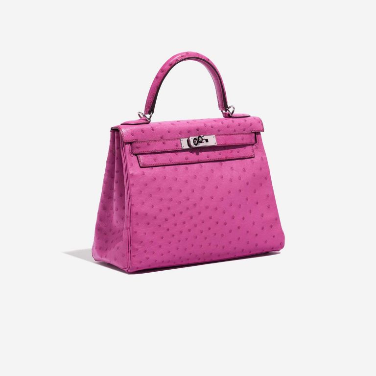 Pre-owned Hermès bag Kelly 28 Ostrich Fuchsia Pink Side Front | Sell your designer bag on Saclab.com