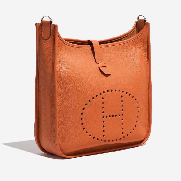 Pre-owned Hermès bag Evelyne 33 Taurillon Clemence Orange H Orange Side Front | Sell your designer bag on Saclab.com