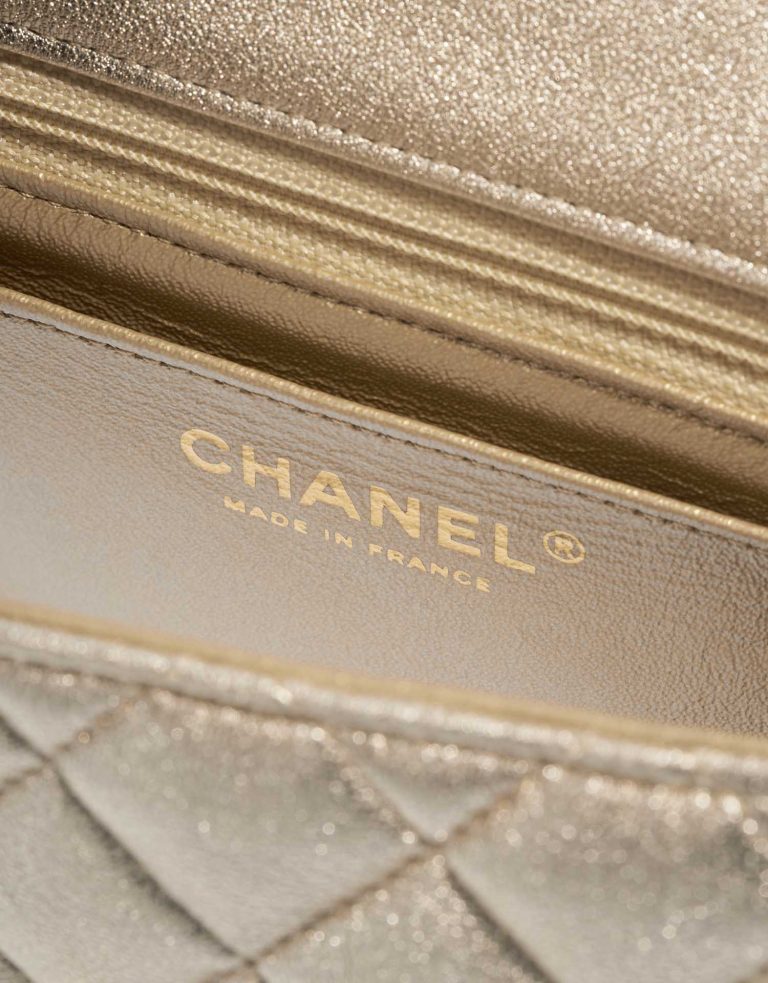 Pre-owned Chanel bag Timeless Mini Square Lamb Gold Gold Logo | Sell your designer bag on Saclab.com