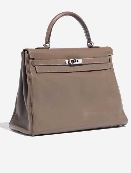 Pre-owned Hermès bag Kelly 35 Swift Etoupe Brown, Grey Side Front | Sell your designer bag on Saclab.com