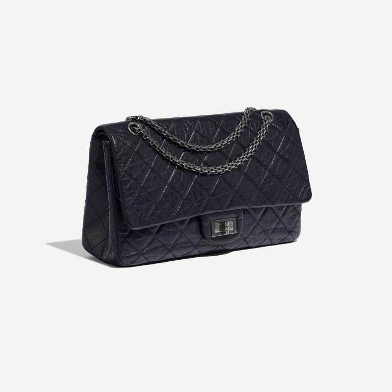 Pre-owned Chanel bag 2.55 Reissue 227 Aged Calfskin Dark Blue Blue Side Front | Sell your designer bag on Saclab.com