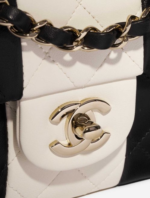 Pre-owned Chanel bag Timeless Medium Lamb Black / White Black, White Closing System | Sell your designer bag on Saclab.com