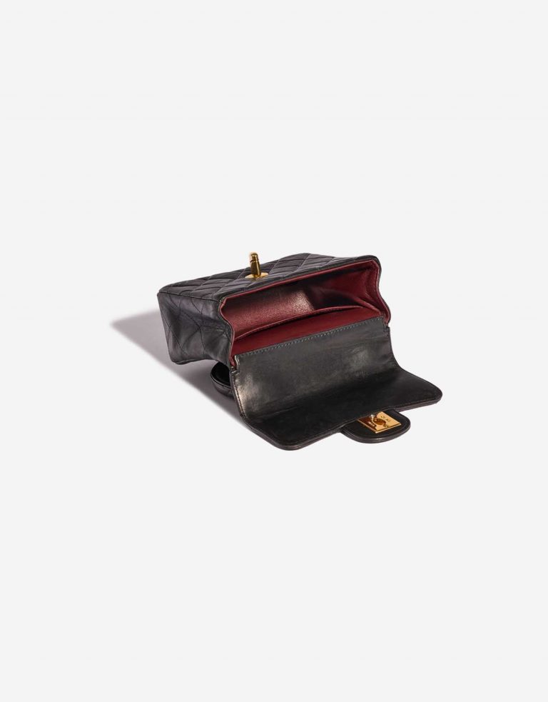 Pre-owned Chanel bag Timeless Handle Small Lamb Black Black Inside | Sell your designer bag on Saclab.com