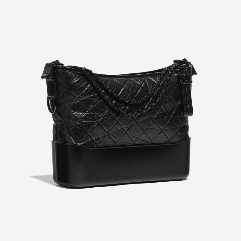 Pre-owned Chanel bag Gabrielle Large Calf Black Black Side Front | Sell your designer bag on Saclab.com