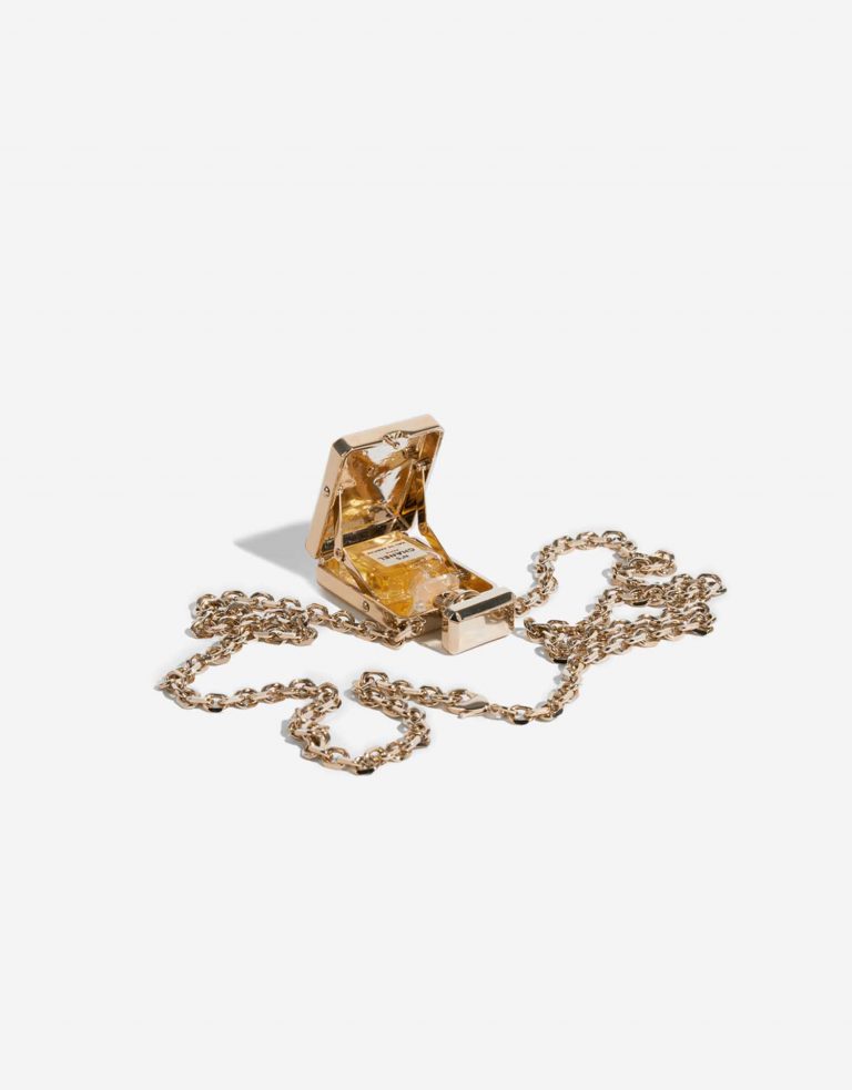 Pre-owned Chanel bag Perfume Necklace Metal Gold / Pearl Gold Inside | Sell your designer bag on Saclab.com