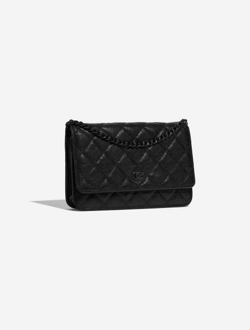 Pre-owned Chanel bag Timeless WOC Calf Black Black Side Front | Sell your designer bag on Saclab.com