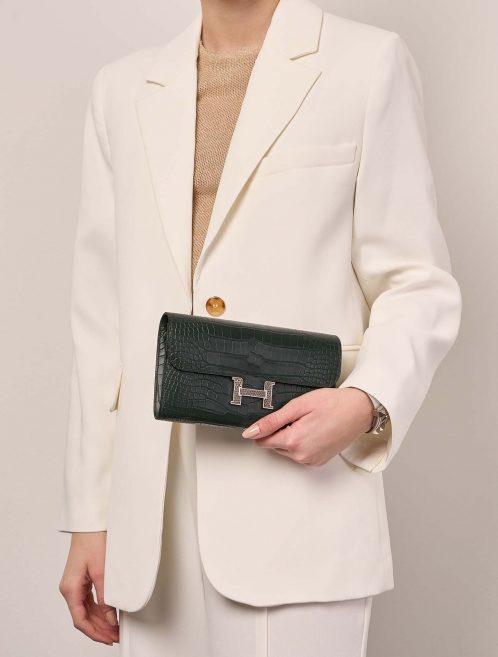 Hermès Constance LongWallet VertFonce-Ombre Sizes Worn | Sell your designer bag on Saclab.com