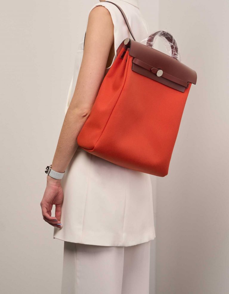 Hermès Herbag Backpack OrangeMécano-RougeH Sizes Worn | Sell your designer bag on Saclab.com