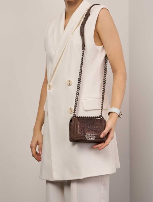 Chanel Boy Micro Lizard / Suede Brown / Gold on Model | Sell your designer bag