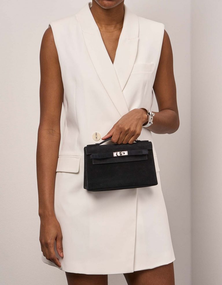 Hermès Kelly Pochette Black 1M | Sell your designer bag on Saclab.com