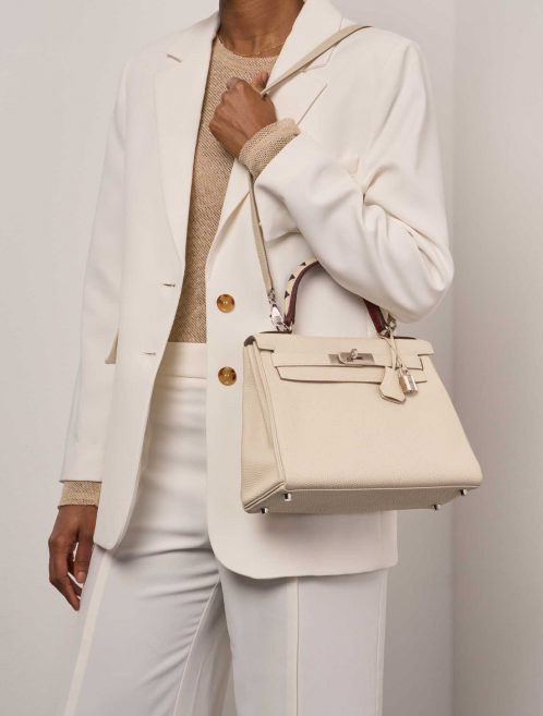 Pre-owned Hermès bag Kelly 28 Au Galop Togo Craie / Black / Fauve / Rouge H Beige, Multicolour | Sell your designer bag on Saclab.com