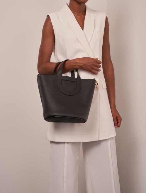 Hermès In The Loop 23 Taurillon Clemence / Swift Black on Model | Sell your designer bag