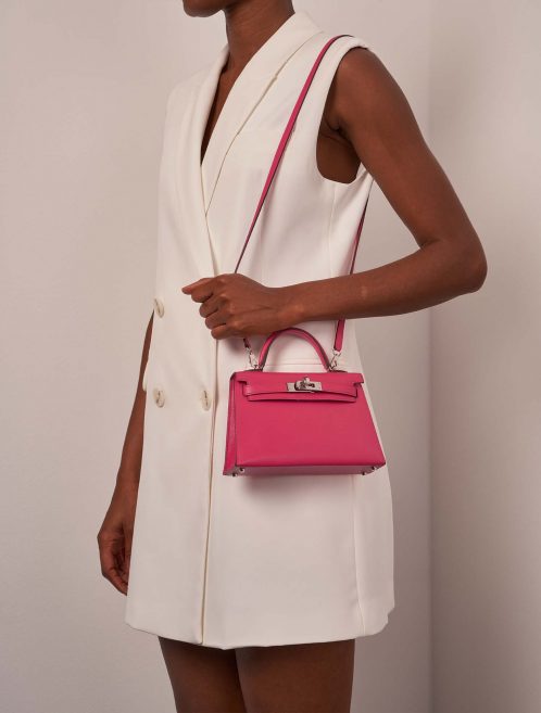 Hermès Kelly Mini RoseExtreme Sizes Worn | Sell your designer bag on Saclab.com